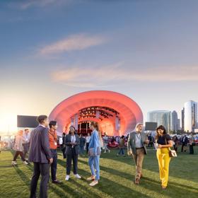 Shot in spring 2023, by The Shipyard/Matthew Turley for the PME campaign. Photo shows a group of professionals talking amongst themselves at the Rady Shell in San Diego.